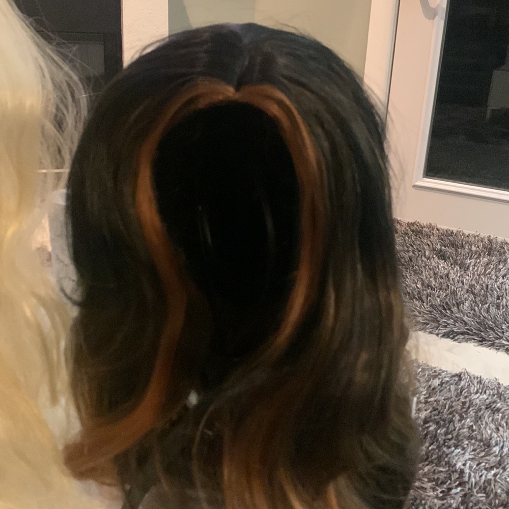 Dark brown with medium brown highlights, long synthetic wig!
